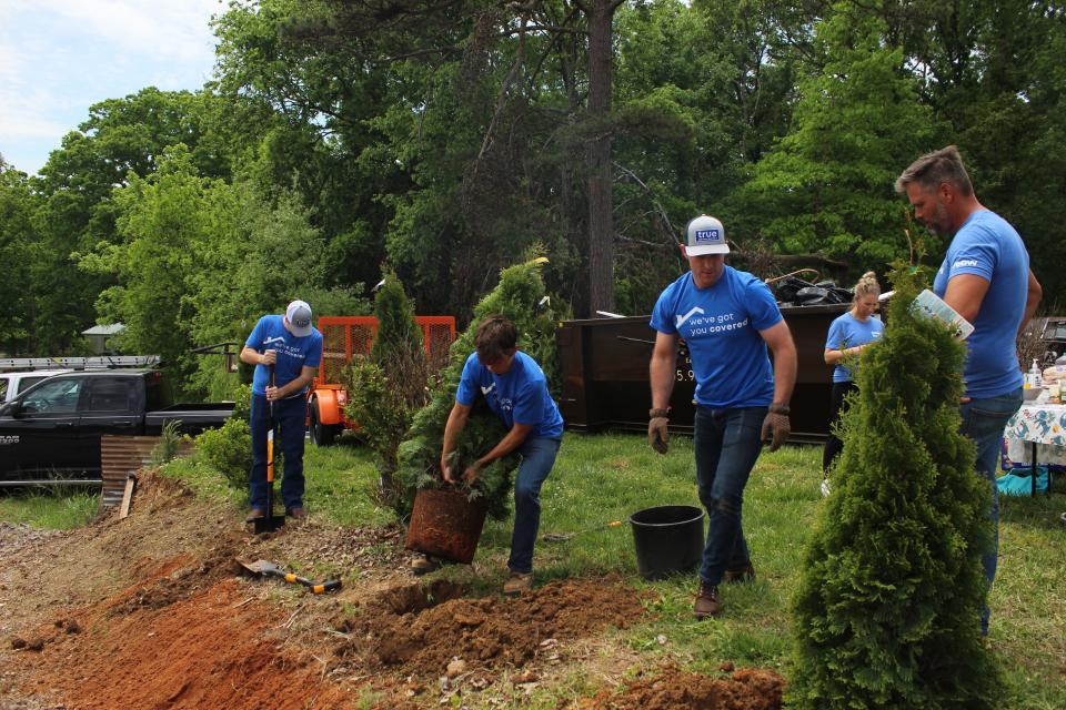 A team of volunteers helped to beautify Tracie Gamble’s new Seymour home. April 24, 2023.