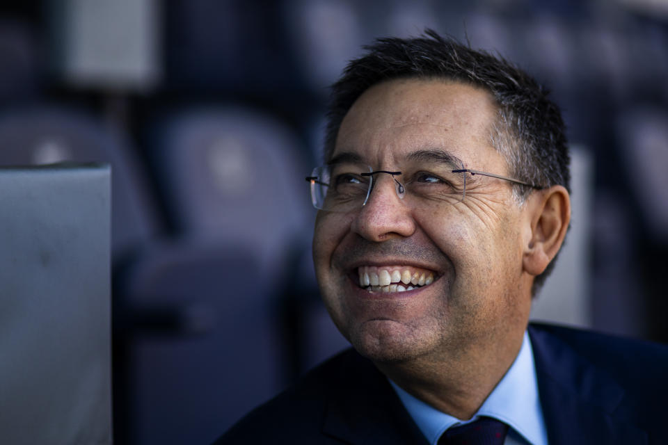 In this Friday, Nov. 8, 2019, photo, President of FC Barcelona Josep Bartomeu smiles during and interview with the Associated Press at the Camp Nou stadium in Barcelona, Spain. Bartomeu told The Associated Press on Friday that "we are preparing this post Messi era." (AP Photo/Emilio Morenatti)