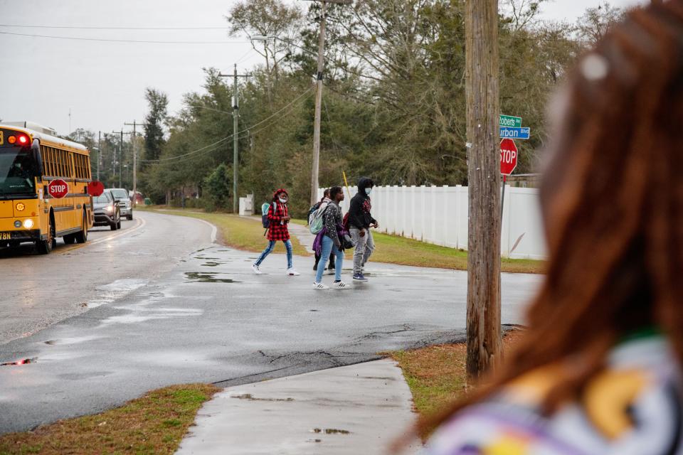 Students walk into what was formerly known as The Meadows Mobile Home Park and is now called Florida Sun Estates Tuesday, Jan. 25, 2022. The new management company has raised the rent prices and forced many tenants to found housing elsewhere.