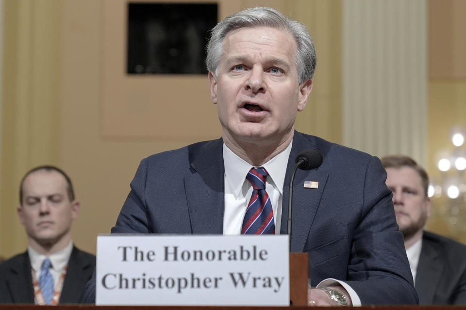 FBI Director Christopher Wray, center, testifies during a House Select Committee focusing on China on Capitol Hill, Wednesday, Jan. 31, 2024, in Washington. (AP Photo/Mariam Zuhaib)