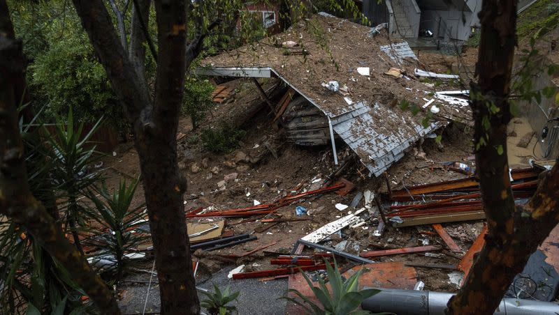 A property sits destroyed by a mudslide during a storm, Tuesday, Feb. 6, 2024, in the Beverly Glen area of Los Angeles. 