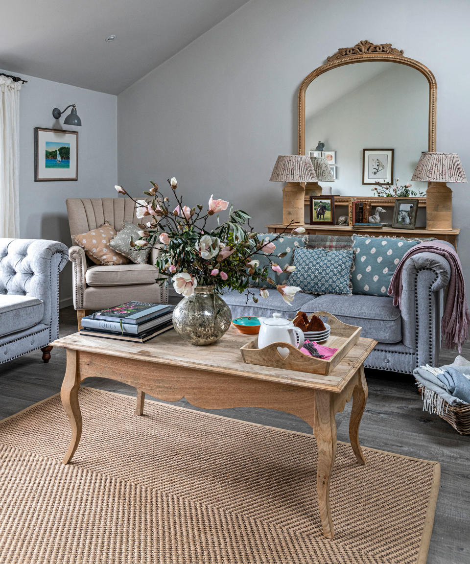 CREATE SYMMETRY IN A SMALL COUNTRY LIVING ROOM