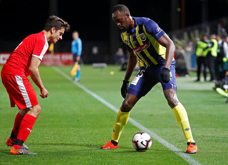 Soccer Football - Central Coast Mariners v Central Coast Select - Central Coast Stadium, Gosford, Australia - August 31, 2018 Central Coast Mariners' Usain Bolt in action REUTERS/David Gray