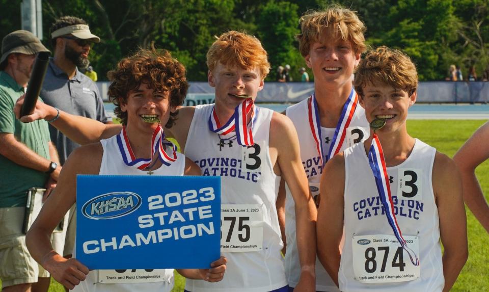 From left to right: Mitchell Drees, Luke Meagher, Will Sheets and Joe Mayer pose with their medals after winning the Kentucky Class 3A state title in the 4x800 relay.
