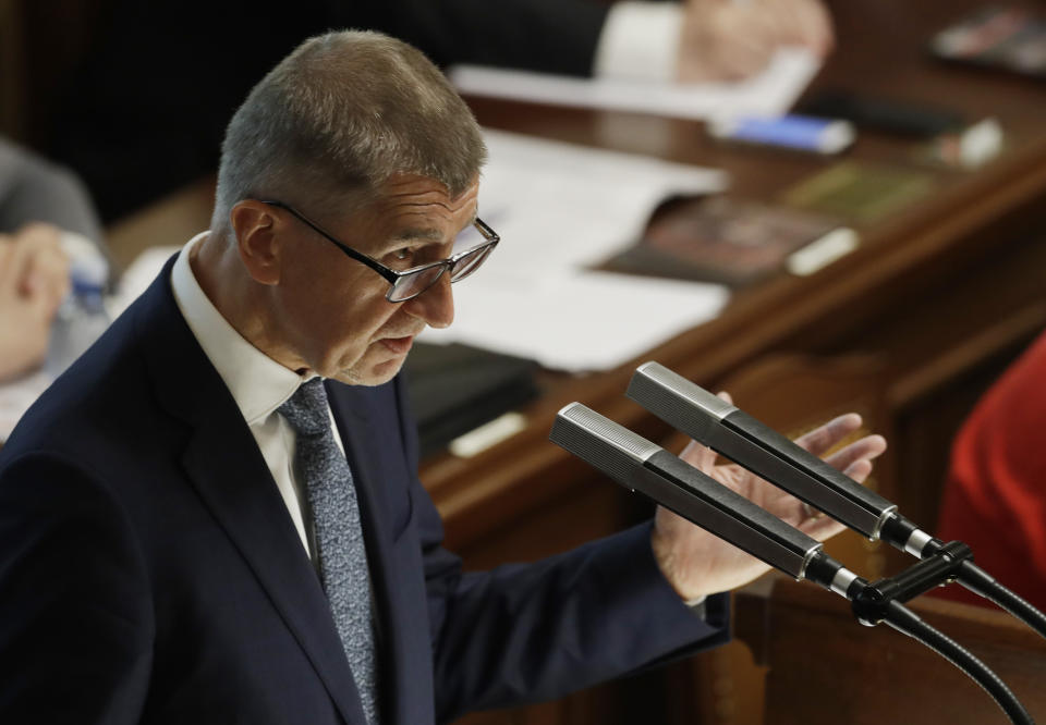 Czech Republic's Prime Minister Andrej Babis addresses lawmakers during a parliament session in Prague, Czech Republic, Wednesday, June 26, 2019. The Czech coalition government led by populist Prime Minister Andrej Babis is facing a parliamentary no-confidence vote over European Union subsidies paid to his former business empire. (AP Photo/Petr David Josek)