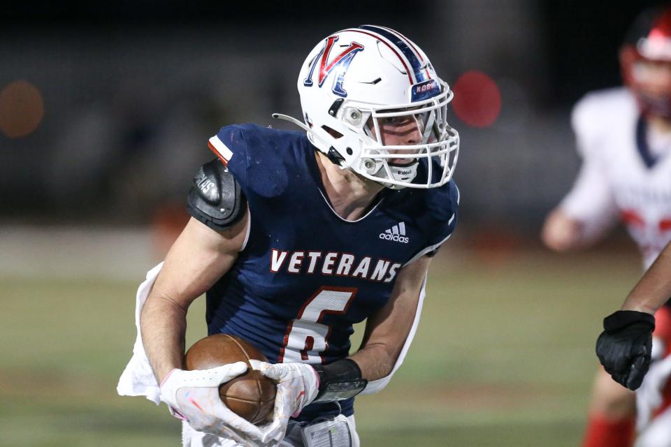 Veterans Memorial's Ryan Wilson catches a pass and attempts to score during the final play of the first half on Friday, Nov. 17, 2023, in Corpus Christi, Texas.