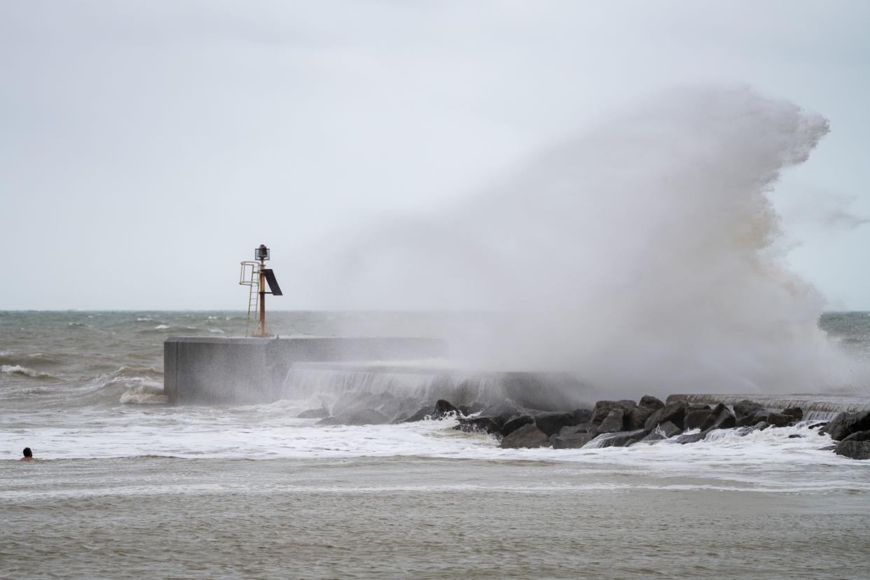 Hastings, UK, 22 Aug 2024, Storm Lilian Batters The South Coast As Swimmer Risks a Dip