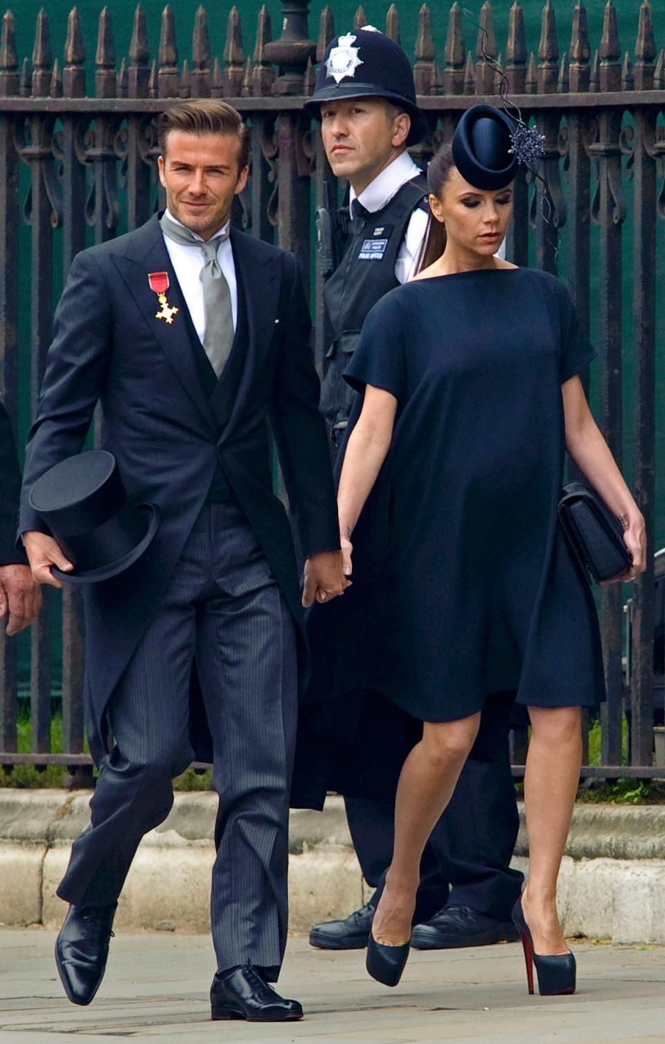 Coordinating navy looks were a sleek statement from the couple (REUTERS)