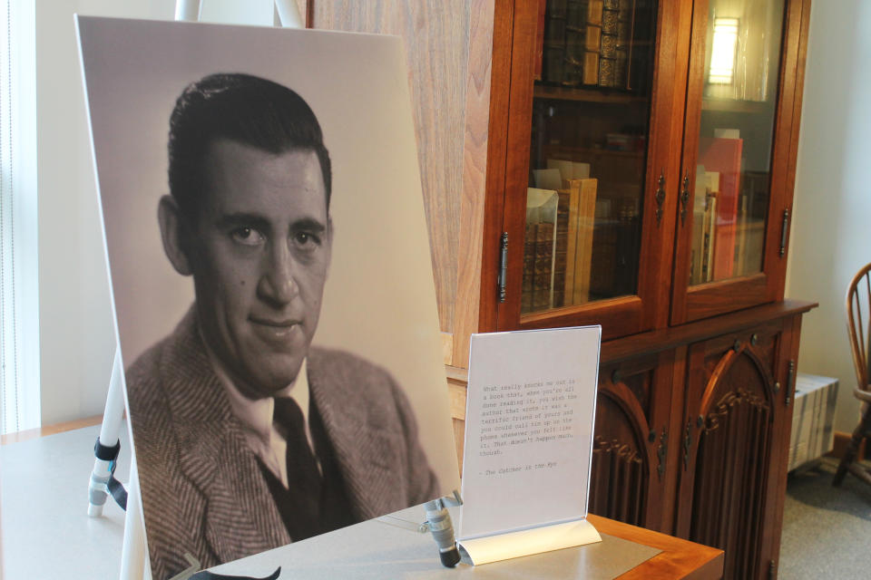 A previously unseen photo of author J.D. Salinger is displayed at the University of New Hampshire in Durham, N.H., on Tuesday, Jan. 22, 2019. The photos taken for the book jacket of Salinger's 1951 novel, "Catcher in the Rye," were among nearly 50,000 images bequeathed to the university by German photographer Lotte Jacobi. (AP Photo/Holly Ramer)