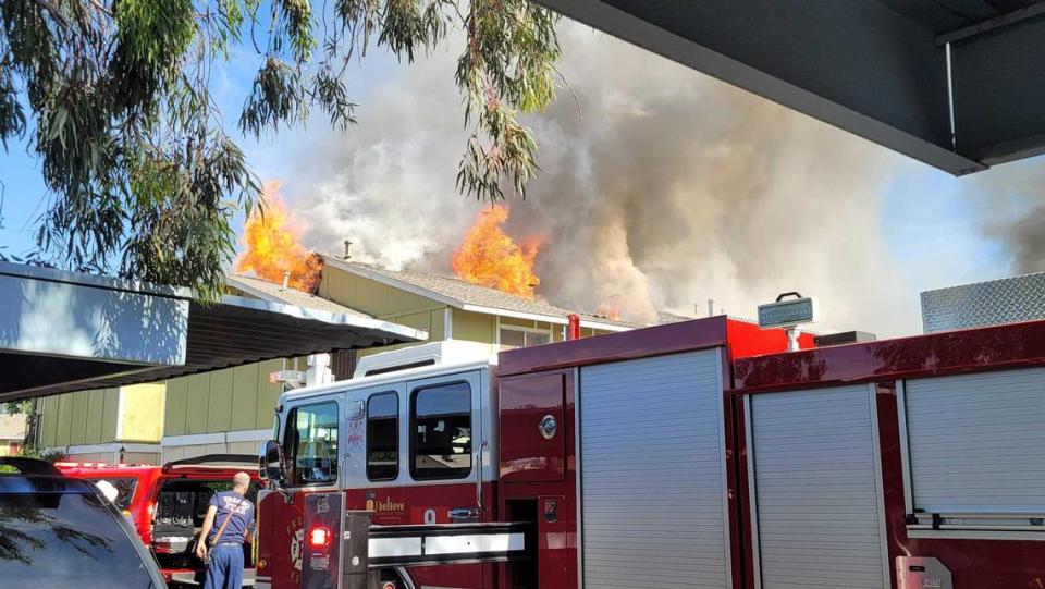 Fresno fire crews respond to an apartment fire near Marks and Dakota avenues on Monday, May 16, 2022.