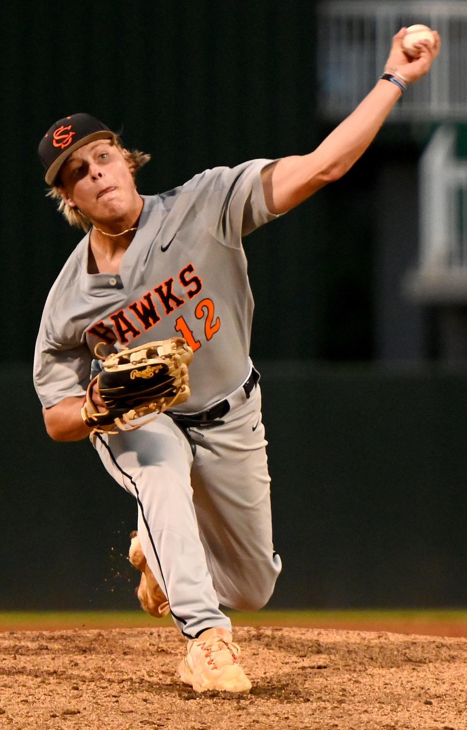 Spruce Creek's Shane Lavin (12) fires a pitch during a Class 7A semifinal last May.