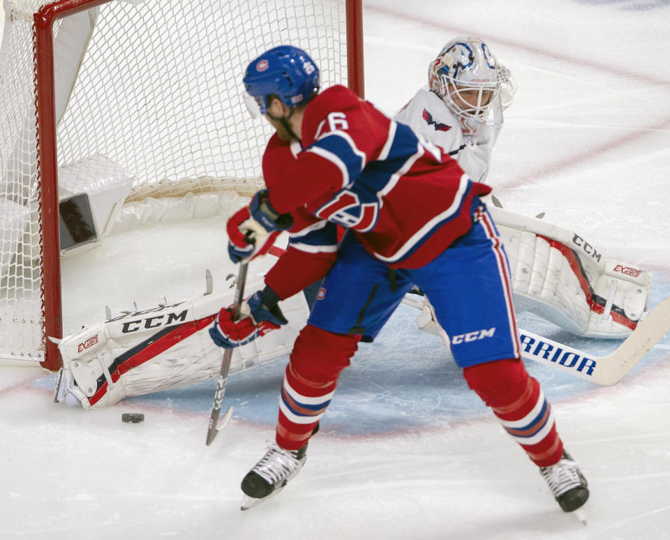Montreal Canadiens defenseman Jeff Petry (26) scores against Washington Capitals goaltender Braden Holtby (70) during first period NHL hockey action Monday, Jan. 27, 2020 in Montreal. (Ryan Remiorz/The Canadian Press via AP)