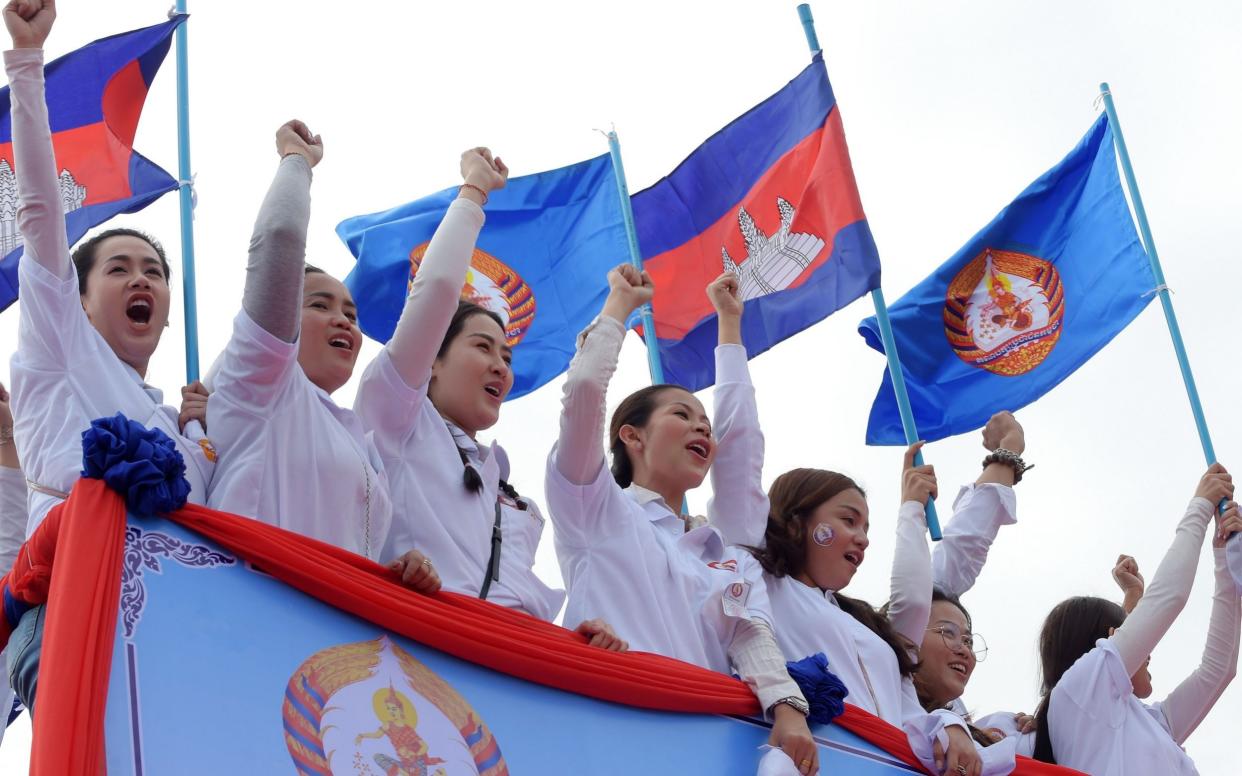 Supporters of Cambodian Prime Minister Hun Sen campaign for his re-election - AFP