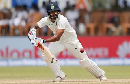 Cricket - Sri Lanka v India - First Test Match - Galle, Sri Lanka - July 26, 2017 - India's cricketer Shikhar Dhawan plays a shot. REUTERS/Dinuka Liyanawatte