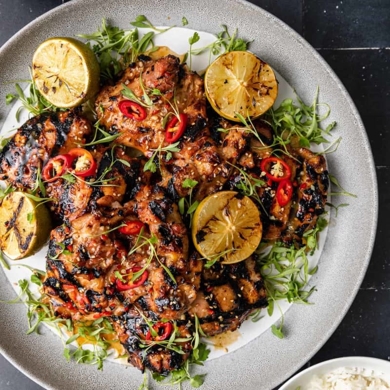 <p>Silk Road Recipes</p><p>Gai Yang chicken is a Thai grilled chicken recipe featuring a spicy lemongrass marinade. Use boneless chicken thighs and you can make this flavorful Asian BBQ in less than 45 minutes!</p><p><strong>Get the recipe: <a href="https://silkroadrecipes.com/gai-yang-chicken/" rel="nofollow noopener" target="_blank" data-ylk="slk:Thai Gai Yang Chicken;elm:context_link;itc:0;sec:content-canvas" class="link ">Thai Gai Yang Chicken</a></strong></p>