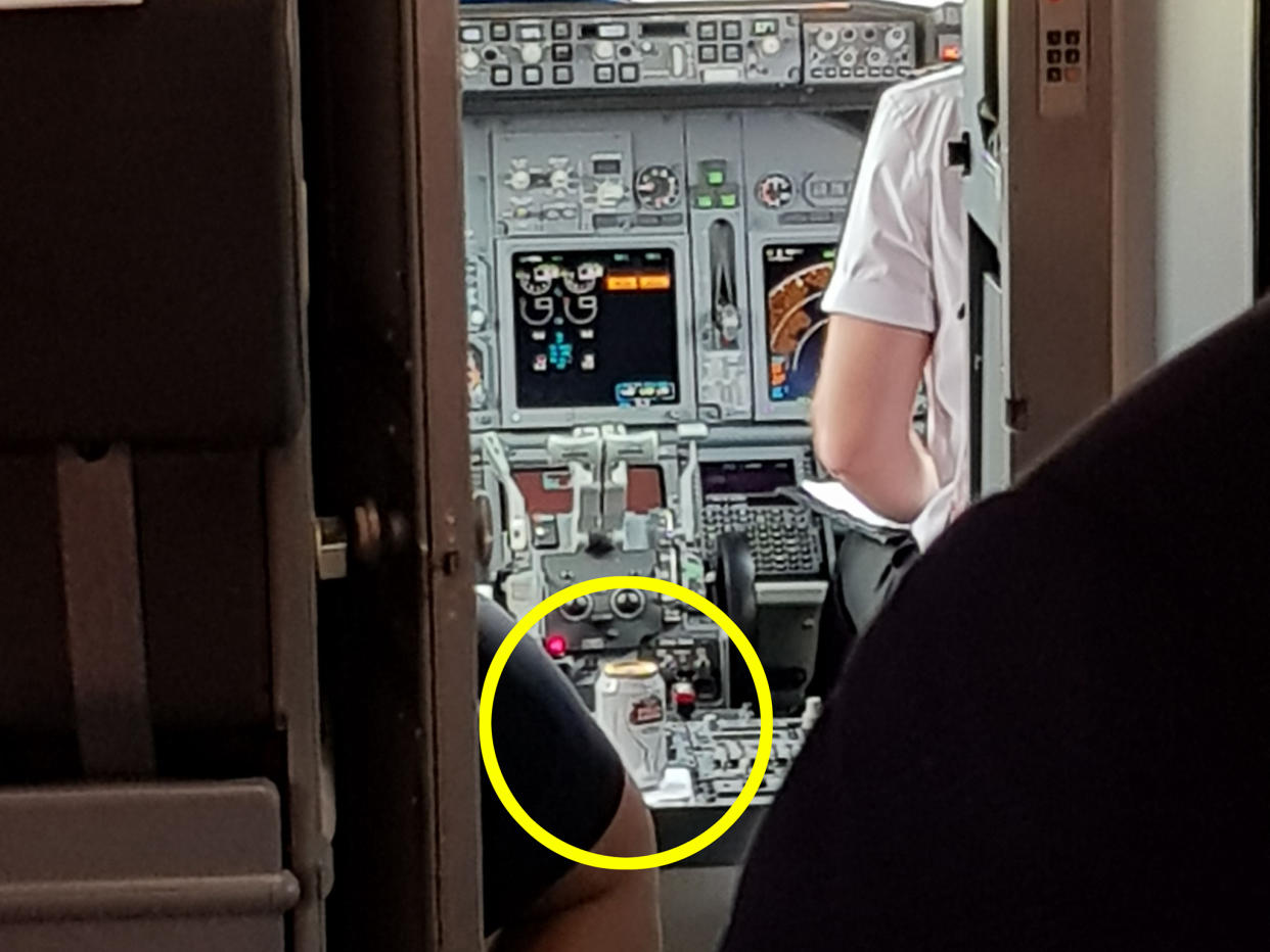 A can of Stella Artois can be seen sitting beside a pilot on the flight from Alicante: Mercury Press & Media