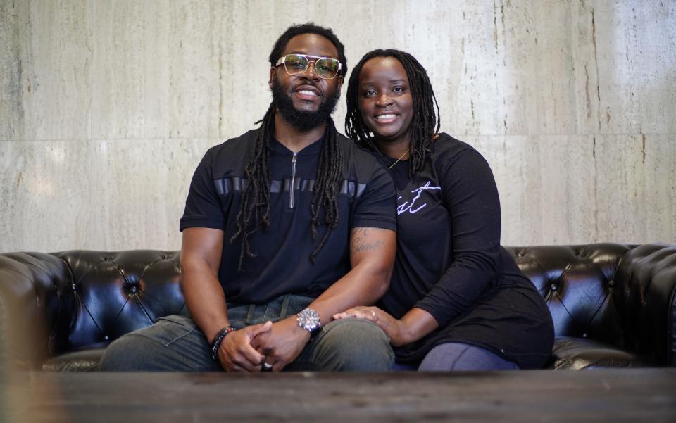 Andarius and Eboni Taylor of Detroit, Mich. pose for a photo inside their apartment in Detroit on Sunday, August 15, 2021. 