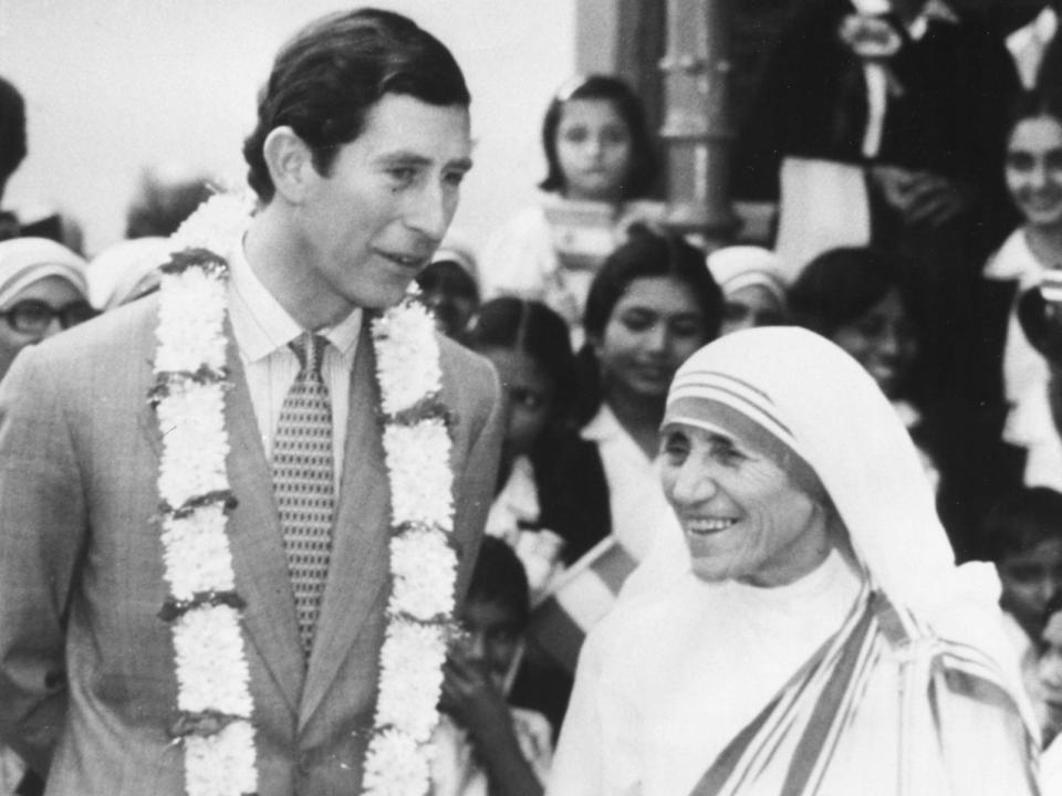 Prince Charles talking to Mother Teresa during his visit to her home for babies and children, Calcutta, December 1980.