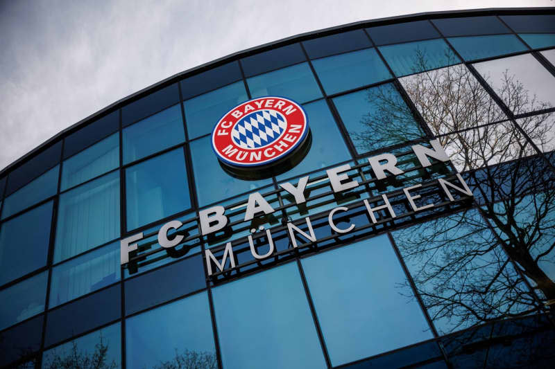 The lettering "FC Bayern München" can be seen under the club logo on a building of the Bundesliga soccer team FC Bayern München at the training ground on Saebener Strasse. Matthias Balk/dpa