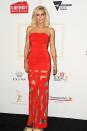 <p>Australia’s new Bachelorette Sophie Monk made sure all eyes were on her on the red carpet in this strapless red gown with cut out details on the bottom.</p>