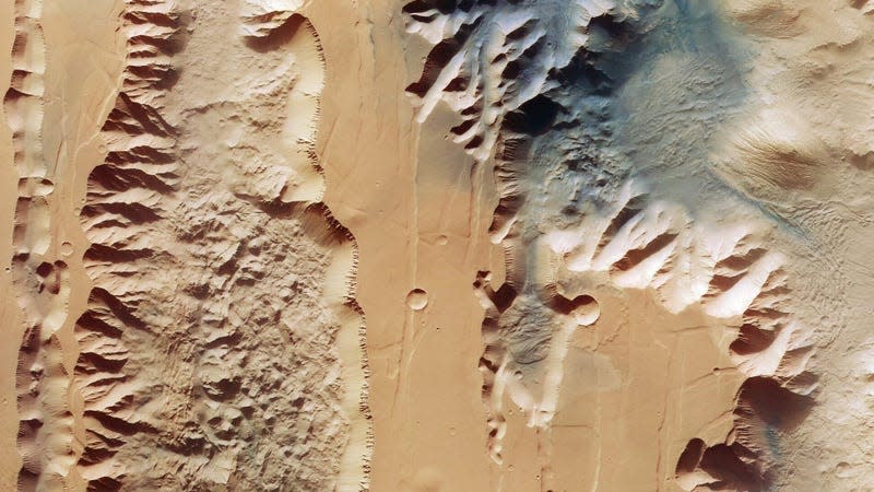Two large canyons on Mars, seen from above.