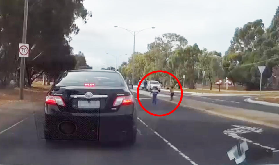 Dashcam footage shows the boys wandering across the 70km/h road outside the daycare. Source: The Age