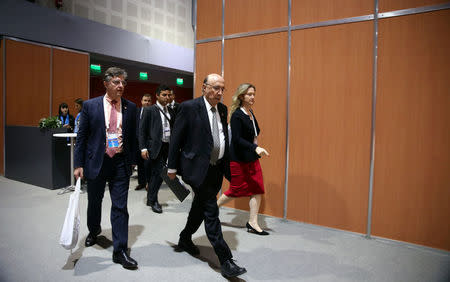 Brazil's Finance Minister Henrique Meirelles arrives for a news conference at the G20 Meeting of Finance Ministers in Buenos Aires, Argentina, March 19, 2018. REUTERS/Marcos Brindicci