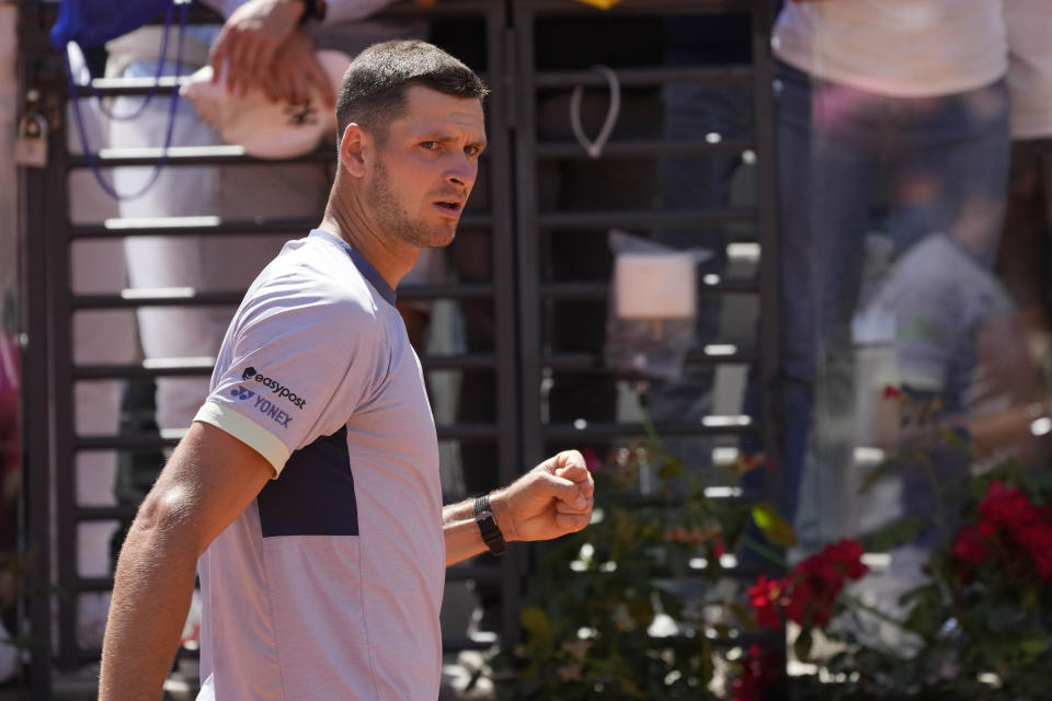 Hubert Hurkacz, of Poland, celebrates after winning his match against Rafael Nadal, of Spain, at the Italian Open tennis tournament in Rome, Saturday, May 11, 2024.(AP Photo/Gregorio Borgia)