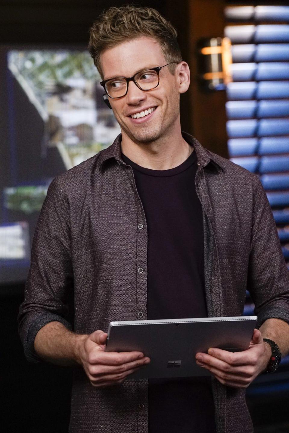 Barrett Foa as Eric Beale