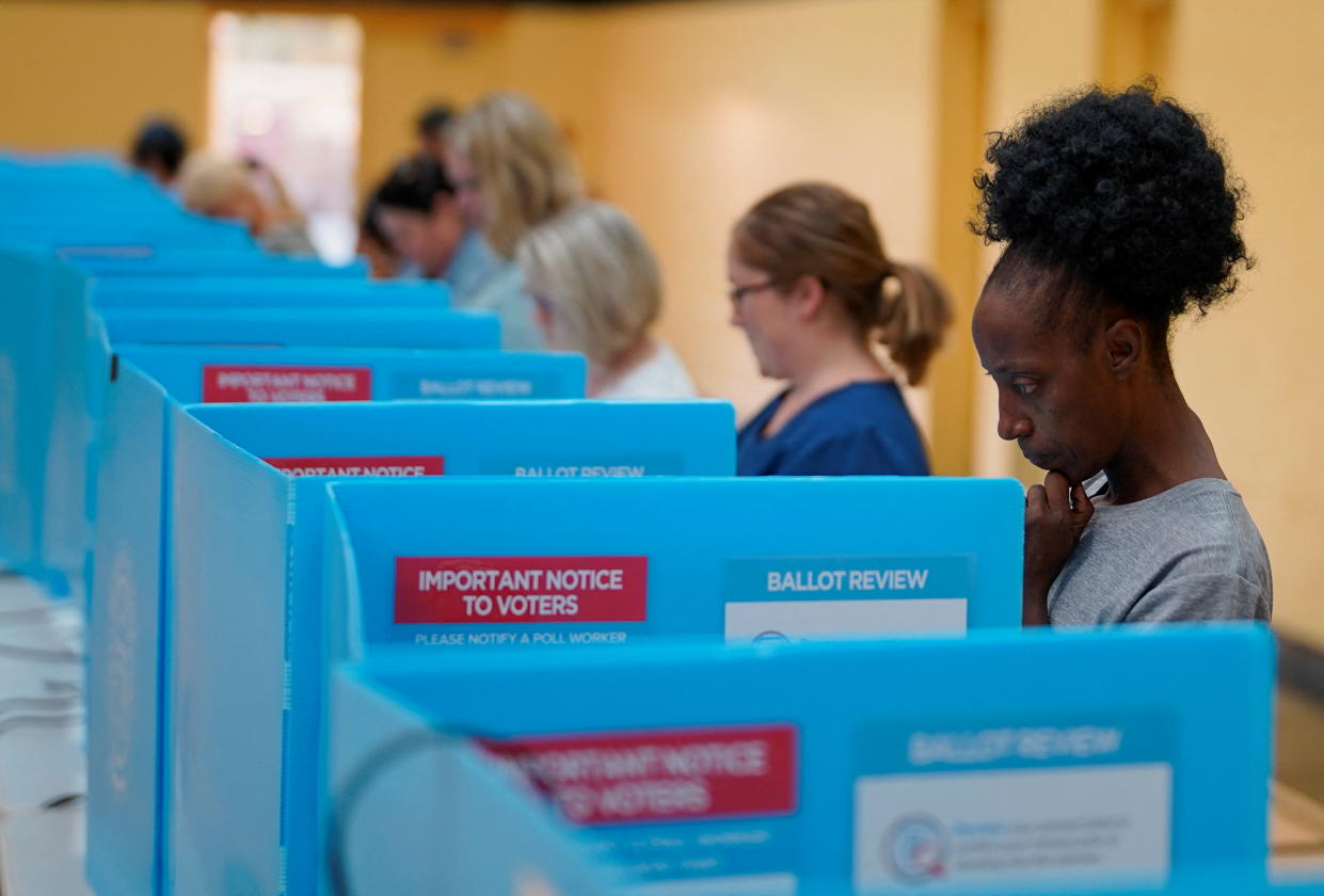 Residents vote during the midterm elections in Calhoun, Ga., in 2022.