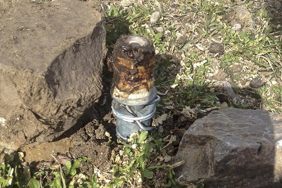 FILE - This March 16, 2017, file photo released by the Bannock County Sheriff's Office shows a cyanide device in Pocatello, Idaho. Citing public safety concerns, the Bureau of Land Management is ending the use of spring-loaded booby traps planted on public lands that eject cyanide powder when triggered to kill coyotes and other livestock predators, a practice wildlife advocates and others have been trying to outlaw for decades. (Bannock County Sheriff's Office via AP, File)