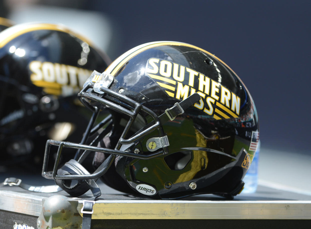 MIAMI GARDENS, FL - SEPTEMBER 10: A Southern Mississippi Golden Eagles helmet sits on the sidelines during the college football game between the Southern Miss Golden Eagles and the University of Miami Hurricanes on September 10, 2022 at the Hard Rock Stadium in Miami Gardens, FL. (Photo by John Rivera/Icon Sportswire via Getty Images)