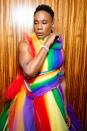 Billy Porter celebrates WorldPride N.Y.C. 2019 in a colorful rainbow-patterned ensemble by Christian Siriano on Sunday.