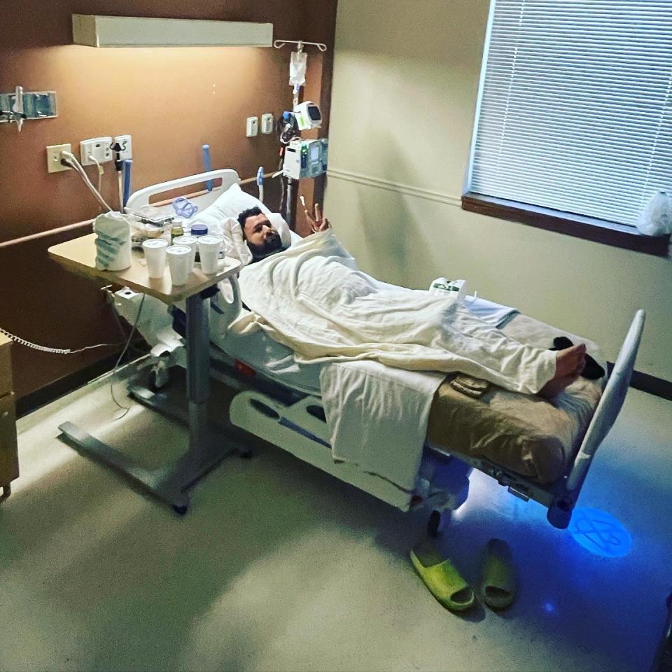 Gabe Lustman, 30, in the hospital for a brown recluse spider bite.  / Credit: Courtesy of Gabe Lustman