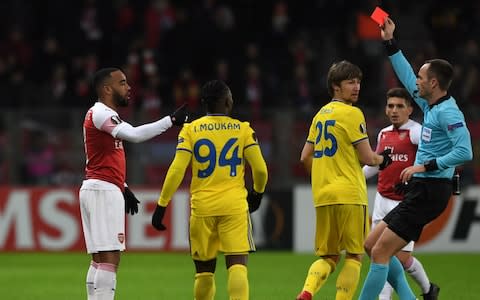 Alexandre Lacazette of Arsenal is shown the red card by referee Srdjan Jovanovic - Credit: Getty Images
