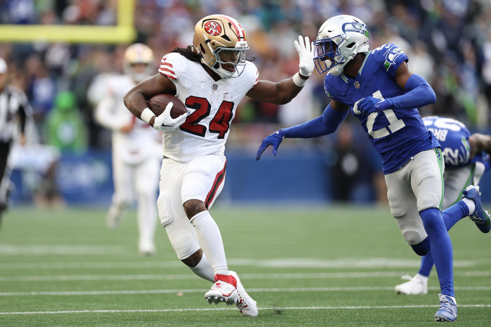 Jordan Mason of the San Francisco 49ers left Thursday night's game with an injury. (Photo by Steph Chambers/Getty Images)