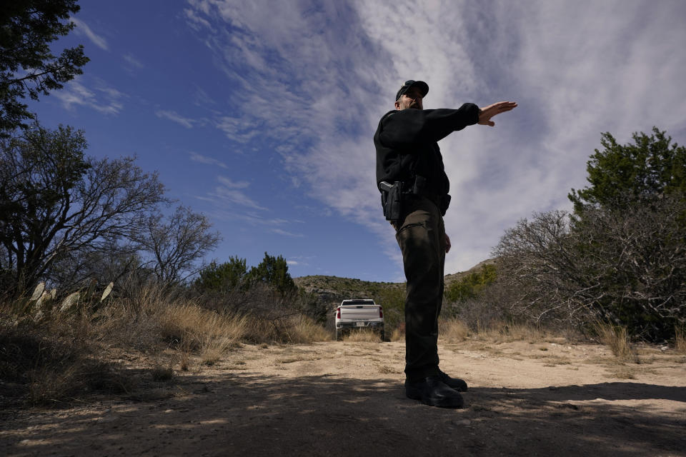 Beau Hester, park superintendent and state park police officer, Friday, Feb. 17, 2023, in Del Rio, Texas. Hester said two of the hiking trails on the park have already been moved to avoid the lights of a wind farm development nearby. (AP Photo/Eric Gay)