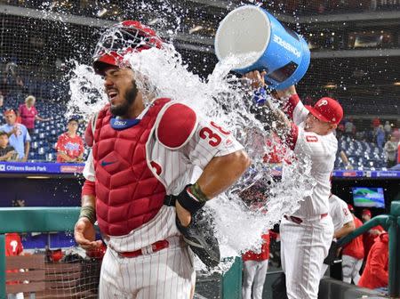 Sep 18, 2018; Philadelphia, PA, USA; Philadelphia Phillies catcher Jorge Alfaro (38) has water doused on him by catcher Wilson Ramos (40) after his three run home run helped beat the New York Mets at Citizens Bank Park. Mandatory Credit: Eric Hartline-USA TODAY Sports