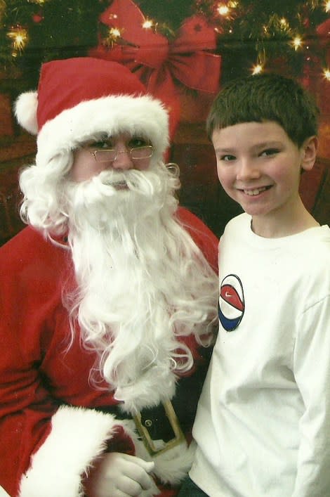 <div class="caption-credit"> Photo by: Terry Ann Johnson</div><p> "We stood in the line at Wal-Mart, waiting with all of the other children for the opportunity to sit on the coveted lap. Then, as Cole sat down to tell Santa the long list he had made, it happened. Looking down at Santa, then turning to me, Cole said, "Mom, Santa has boobs." How could I have missed that? They didn't even have a jolly, fat man as the beloved Santa. For the first time in my journey to get a photo with Santa, I now had one where all Cole did was stare at Santa's boobs." - Terry Ann Johnson, <a href="http://voices.yahoo.com/christmas-memories-santa-visits-11917794.html?cat=25" data-ylk="slk:Christmas Memories of Santa Visits;elm:context_link;itc:0;sec:content-canvas;outcm:mb_qualified_link;_E:mb_qualified_link;ct:story;" class="link  yahoo-link">Christmas Memories of Santa Visits</a> </p>