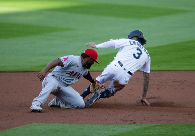 SEATTLE, WA - AUGUST 05: Luis Rengifo #4 of the Los Angeles Angels can't get the tag on J.P. Crawford.