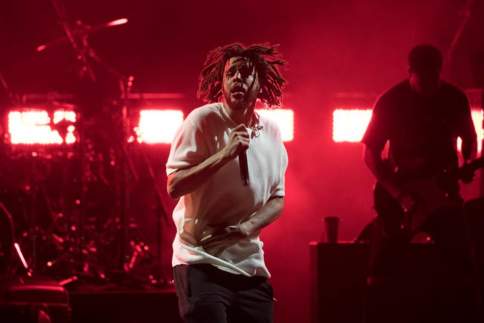 FILE - In this Nov. 4, 2016, file photo, J. Cole performs during a campaign rally for Democratic presidential candidate Hillary Clinton in Cleveland. A track off J. Cole’s forthcoming album has some speculating the rapper is taking shots at Kanye West. “False Prophets” is included on Cole’s “4 Your Eyez Only,” which is set for release on Dec. 9, 2016. (AP Photo/Matt Rourke, File)