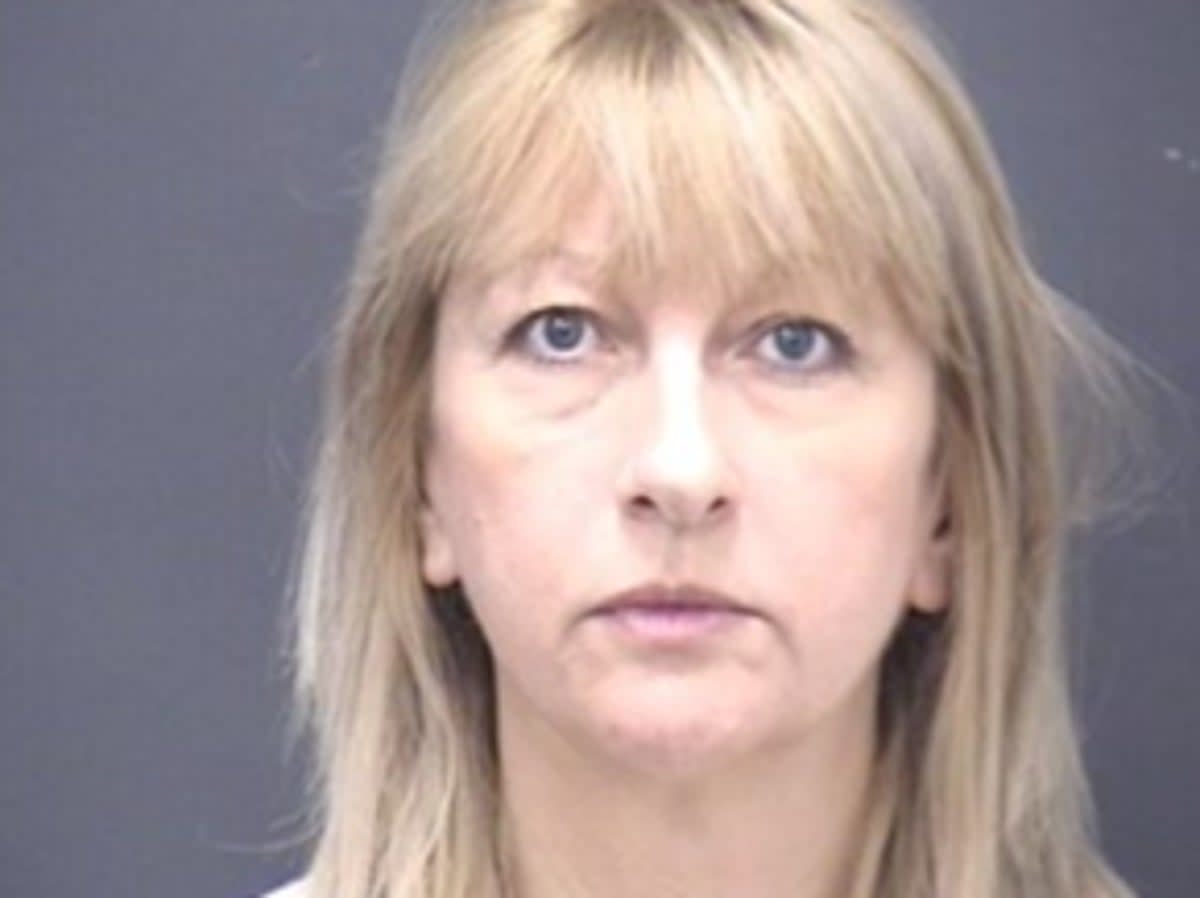 Lisa Arnold, 52, admitted to taking money from evidence bags  (Dorset Police)