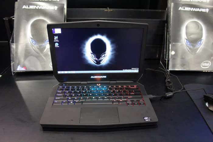 The Alienware 13 is Dell's smallest gaming notebook. It has a 13.3-inch Full HD IPS display, packs an Intel Core i5-4210U (1.7GHz, 3MB smart cache), NVIDIA GeForce GTX 860M (2GB VRAM), 16GB RAM, and a 1TB HDD. It'll come with Windows 8.1, has a DVDRW drive and is eligible for a reduced price on the Alienware Graphics Amplifier. It costs $1,999