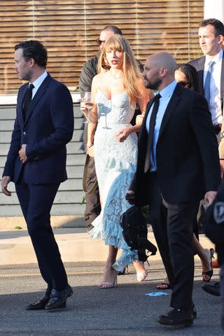 <p>Backgrid</p> Taylor Swift attends the wedding reception of Margaret Qualley and Jack Antanoff.