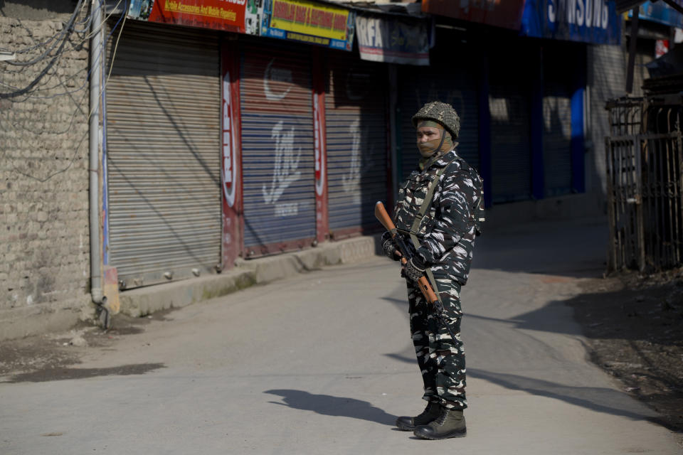 <p> An Indian paramilitary soldier stands guard outside a closed market during a strike in Srinagar, Indian controlled Kashmir, Thursday, Feb. 28, 2019. As tensions escalate between India and Pakistan, shops and business remained closed for the second consecutive day in Indian portion of Kashmir following a strike call by separatist leaders to protest Tuesday's raids on key separatist leaders by Indian intelligence officers. (AP Photo/Dar Yasin) </p>