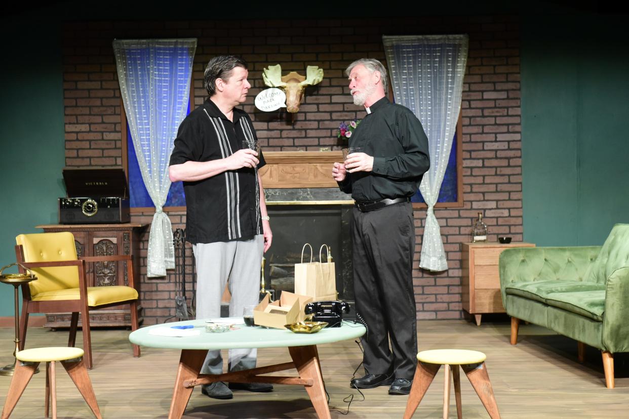 Daniel Corban, left, played by Eric Gustafson of Ashland, gets a little advice from Father Kelleher, played by Doug Wertz of Mansfield, during a rehearsal for "Catch Me If You Can: opening Friday at the Mansfield Playhouse.