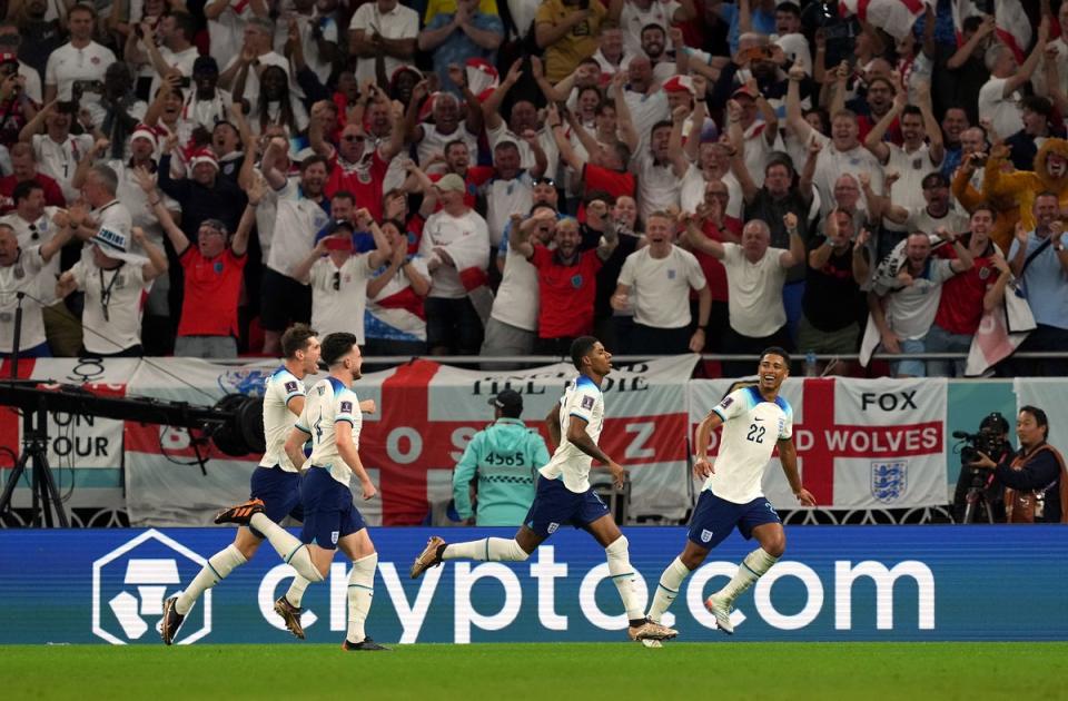 England fans celebrate after Rashford scored (PA)