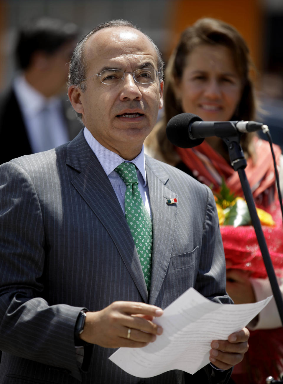 Mexico's President Felipe Calderon speaks with journalists after his arrival at the Jose Marti airport in Havana, Cuba, Wednesday, April 11, 2012. Calderon is on a two-day official visit to Cuba. (AP Photo/Javier Galeano)