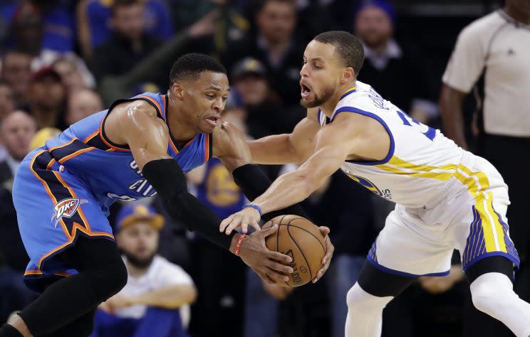 Stephen Curry and Russell Westbrook fought for one starting spot in the Western Conference. (AP)