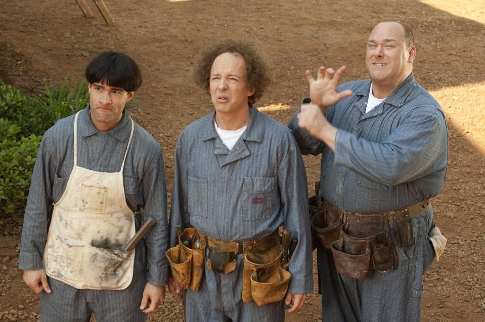 In this image released by 20th Century Fox, from left, Chris Diamantopoulos, Sean Hayes and Will Sasso are shown in a scene from "The Three Stooges." (AP Photo/20th Century Fox, Peter Iovino)